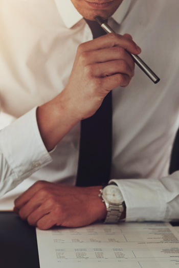 A man holding a pen